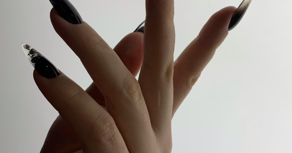 Black and silver chrome nails — one of 2026's top black nail designs