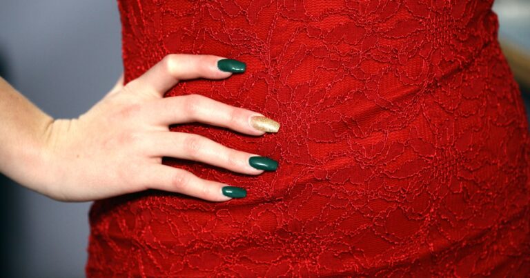 Christmas nails 2026 with a festive green polish shown on a hand
