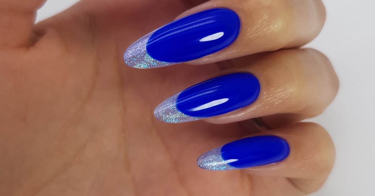 Colored french tip nails: blue almond nails with silver metallic tips