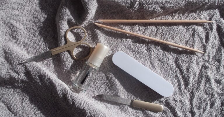 How to remove gel nail polish at home — manicure tools laid out for a soak-off
