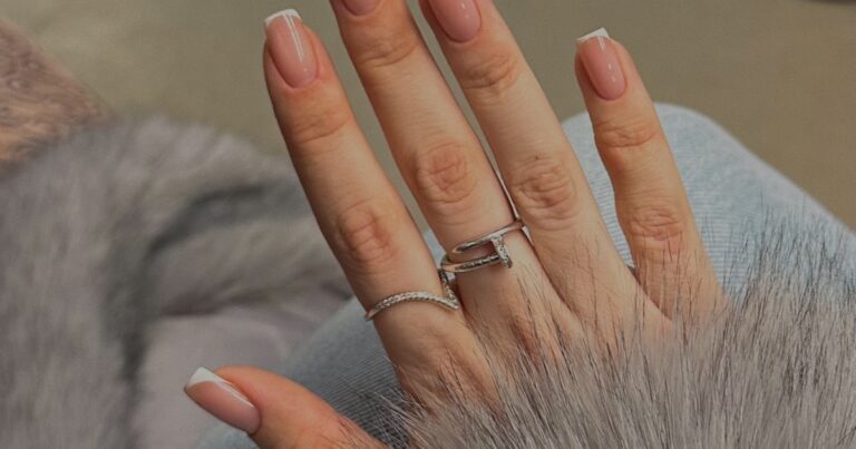 Wedding nails with a soft manicure shown alongside a ring