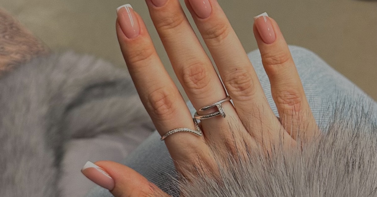 Wedding nails with a soft manicure shown alongside a ring