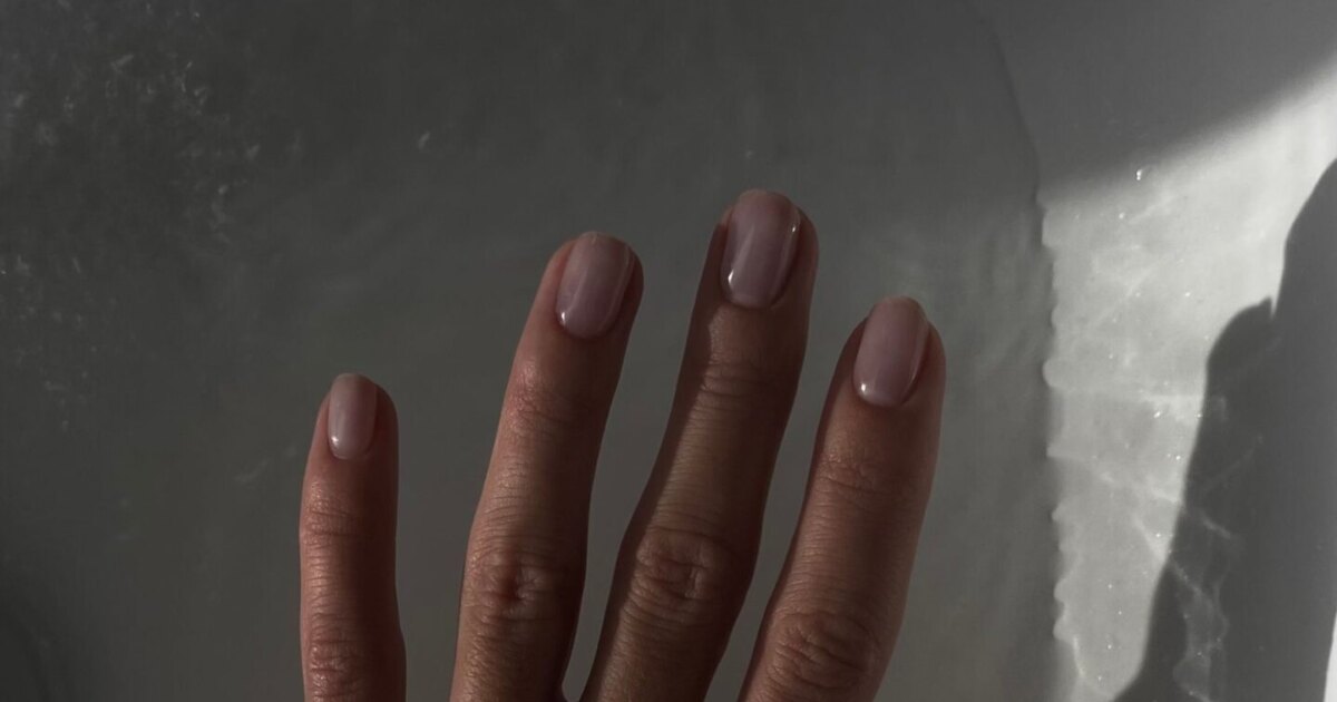 Short oval nails for chubby fingers in a soft nude shade