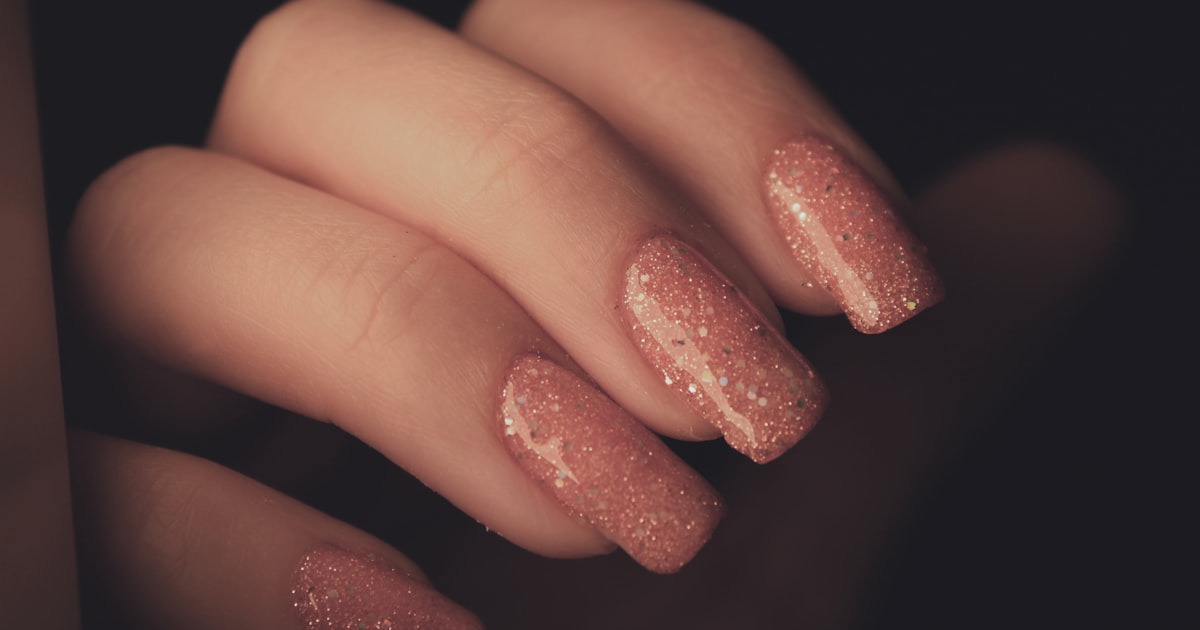 Pink ombre dip powder nails manicure close up