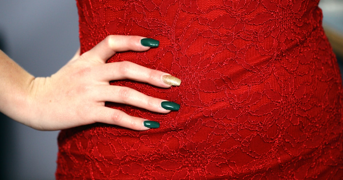 Christmas nails 2026 with a festive green polish shown on a hand